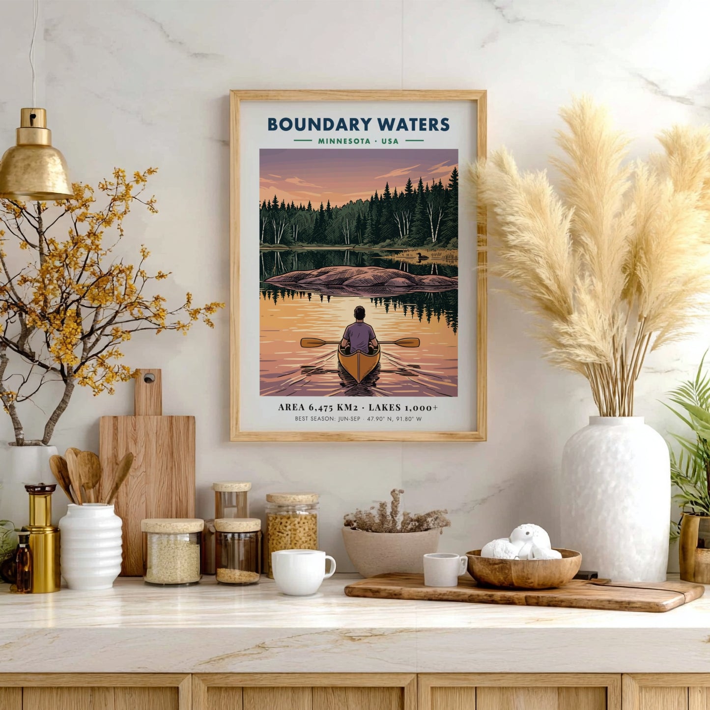 Poster of a lone kayaker paddling toward an island on Boundary Waters Minnesota lake.