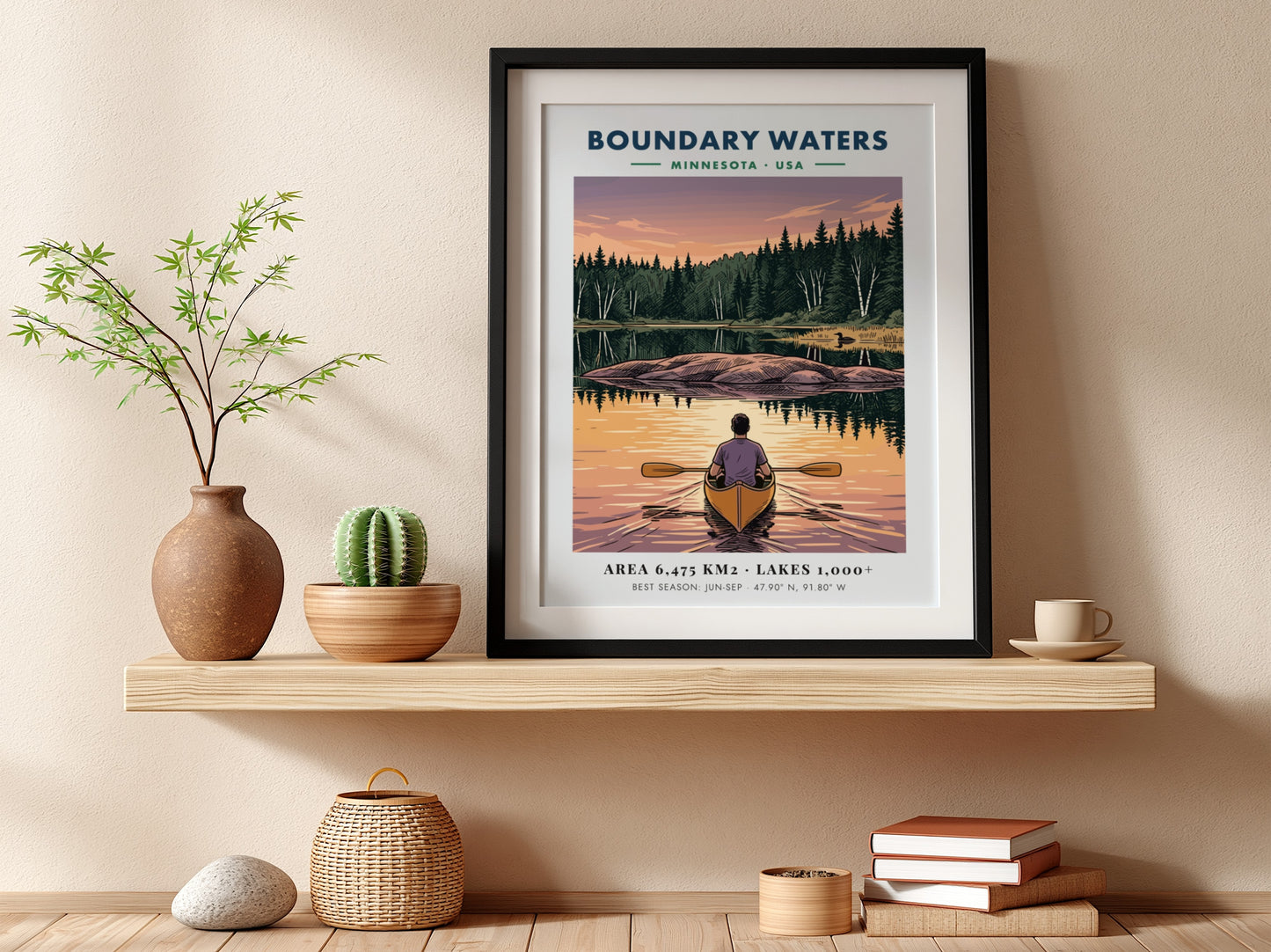 Poster of a lone kayaker paddling toward an island on Boundary Waters Minnesota lake.