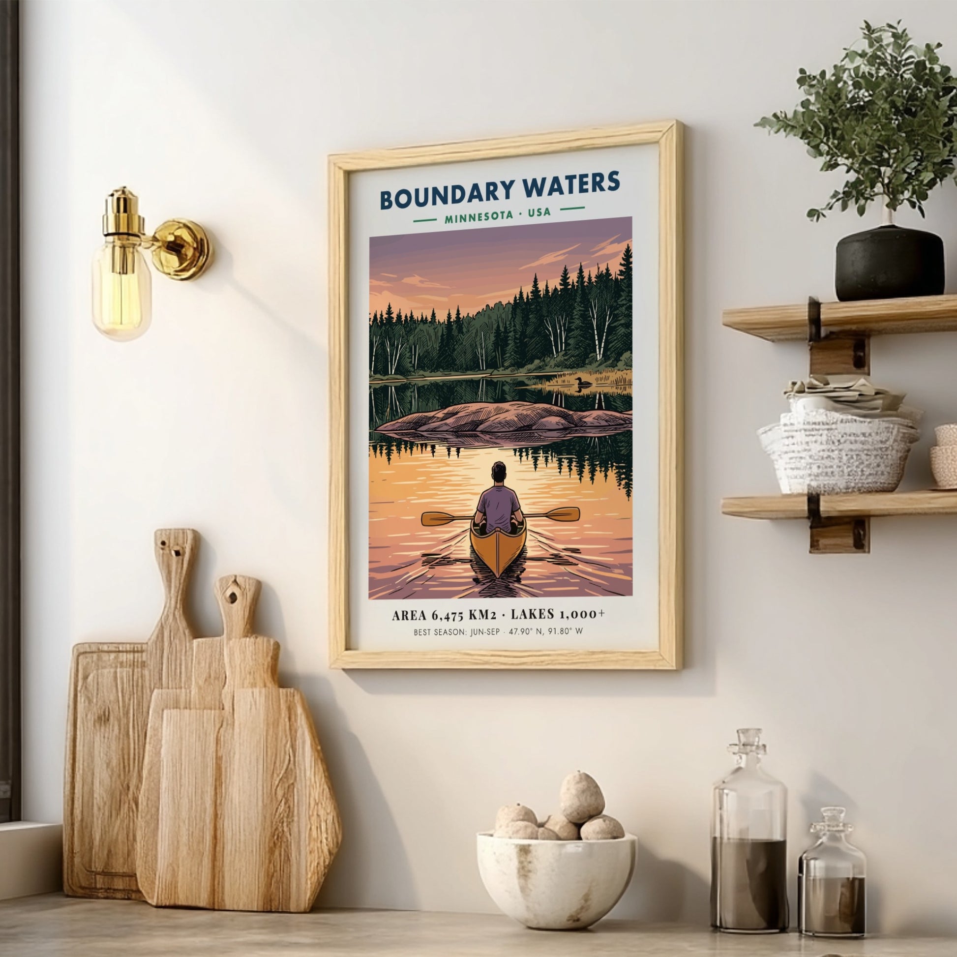 Poster of a lone kayaker paddling toward an island on Boundary Waters Minnesota lake.
