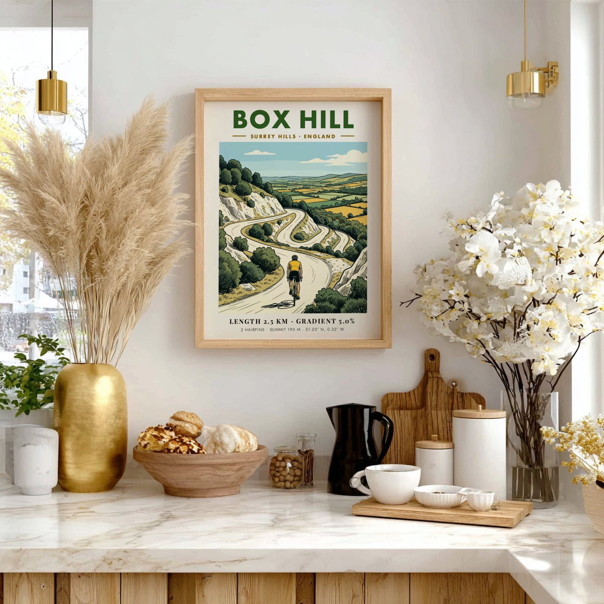 Poster of a cyclist climbing the winding roads of Box Hill in Surrey Hills.