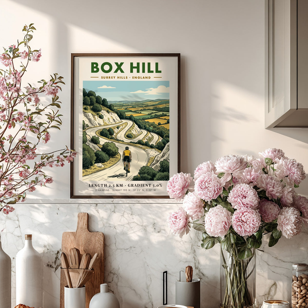 Poster of a cyclist climbing the winding roads of Box Hill in Surrey Hills.