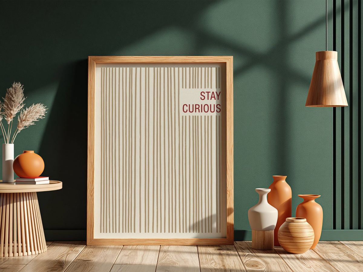 Motivational poster featuring vertical tan brushstrokes and the words Stay Curious in red.
