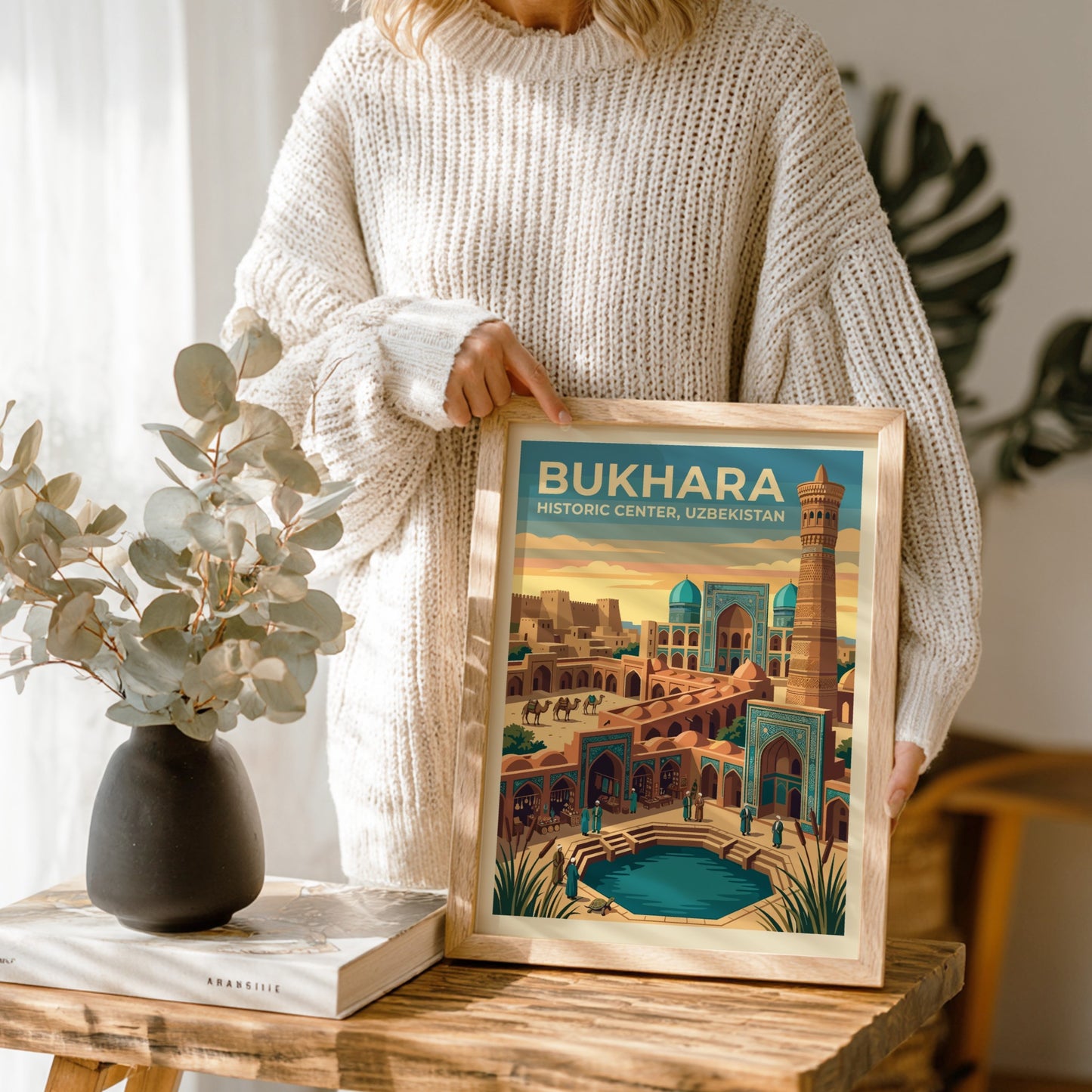 Travel poster of Bukhara Historic Center featuring a tall minaret, turquoise domes, camels, and a reflecting