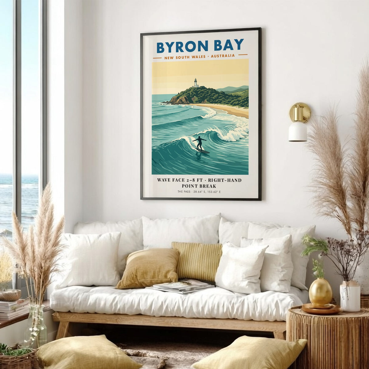 Poster featuring the Byron Bay lighthouse above a surfer riding a blue wave.