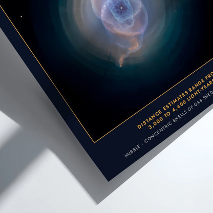 Poster displaying the Cat's Eye Nebula with glowing blue and orange gas clouds
