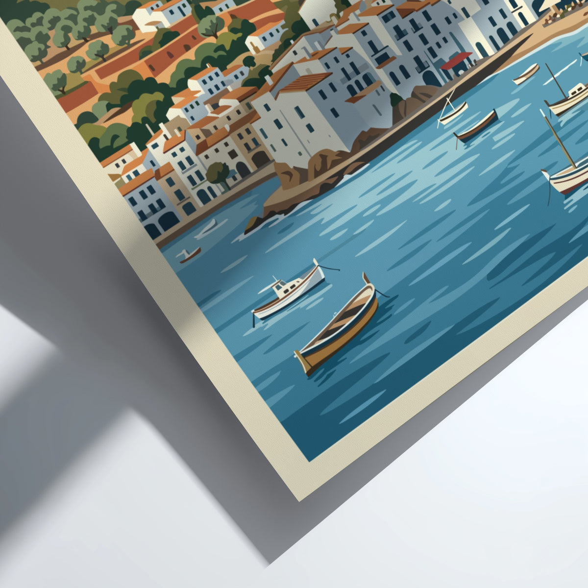 Poster of Cadaqués Spain featuring white buildings, a church, and boats on water.