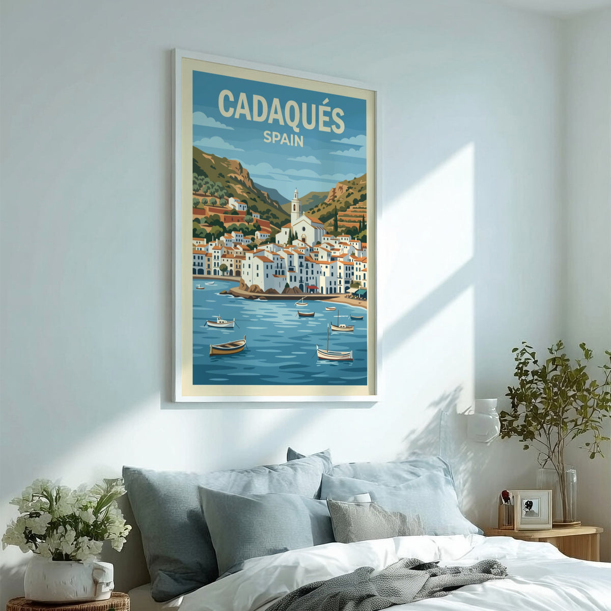 Poster of Cadaqués Spain featuring white buildings, a church, and boats on water.