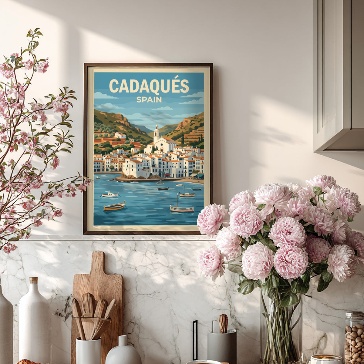 Poster of Cadaqués Spain featuring white buildings, a church, and boats on water.