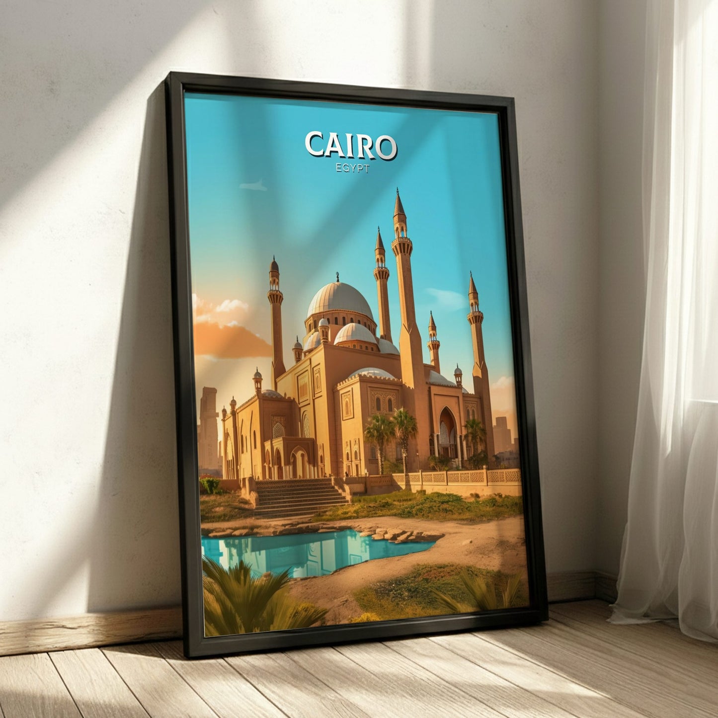 Framed poster of a mosque in Cairo with 'CAIRO' text on a blue sky background.