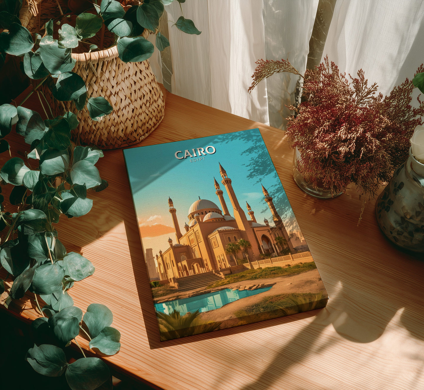 Book titled 'Cairo' on a wooden table with plants