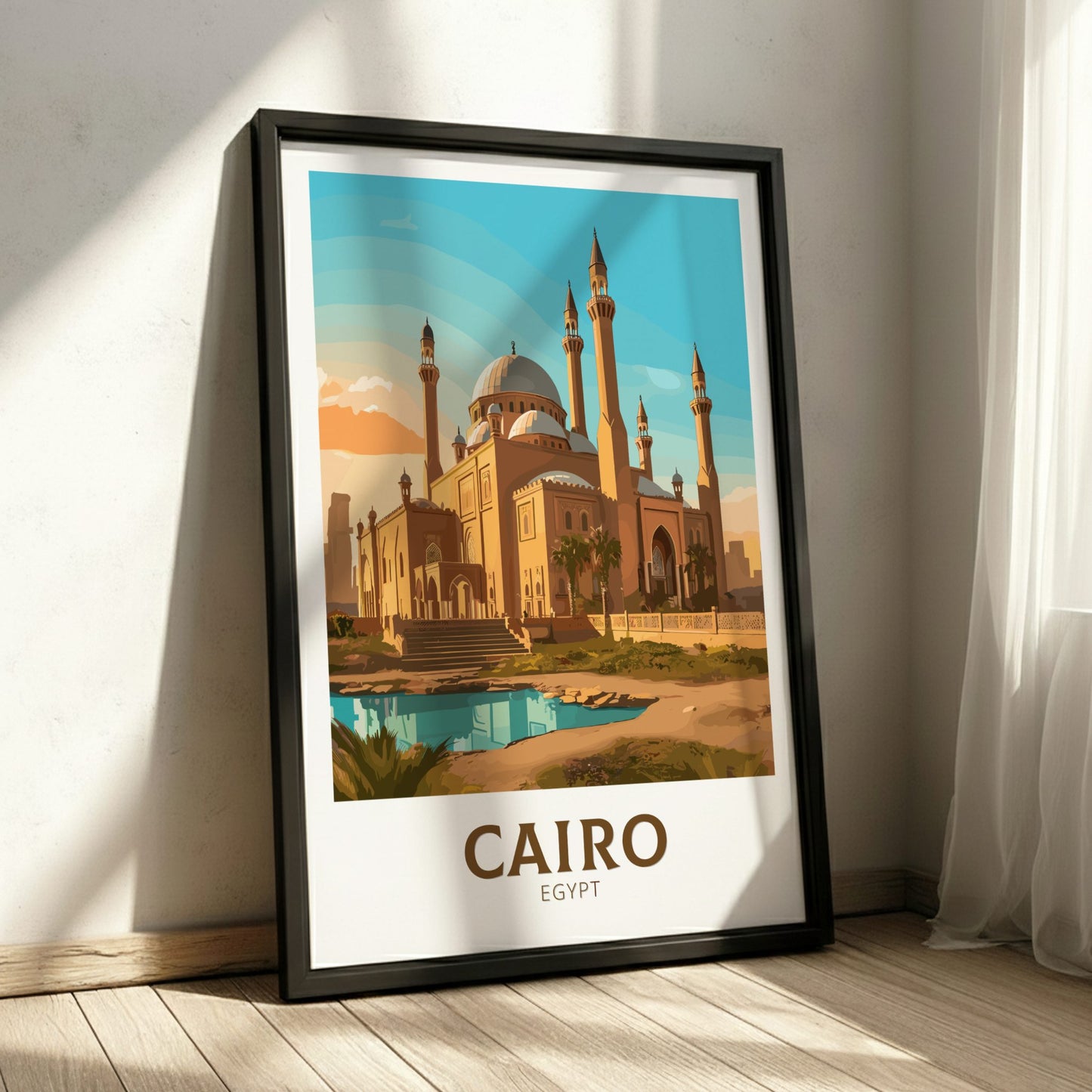 Framed poster of a mosque in Cairo, Egypt on a wall.