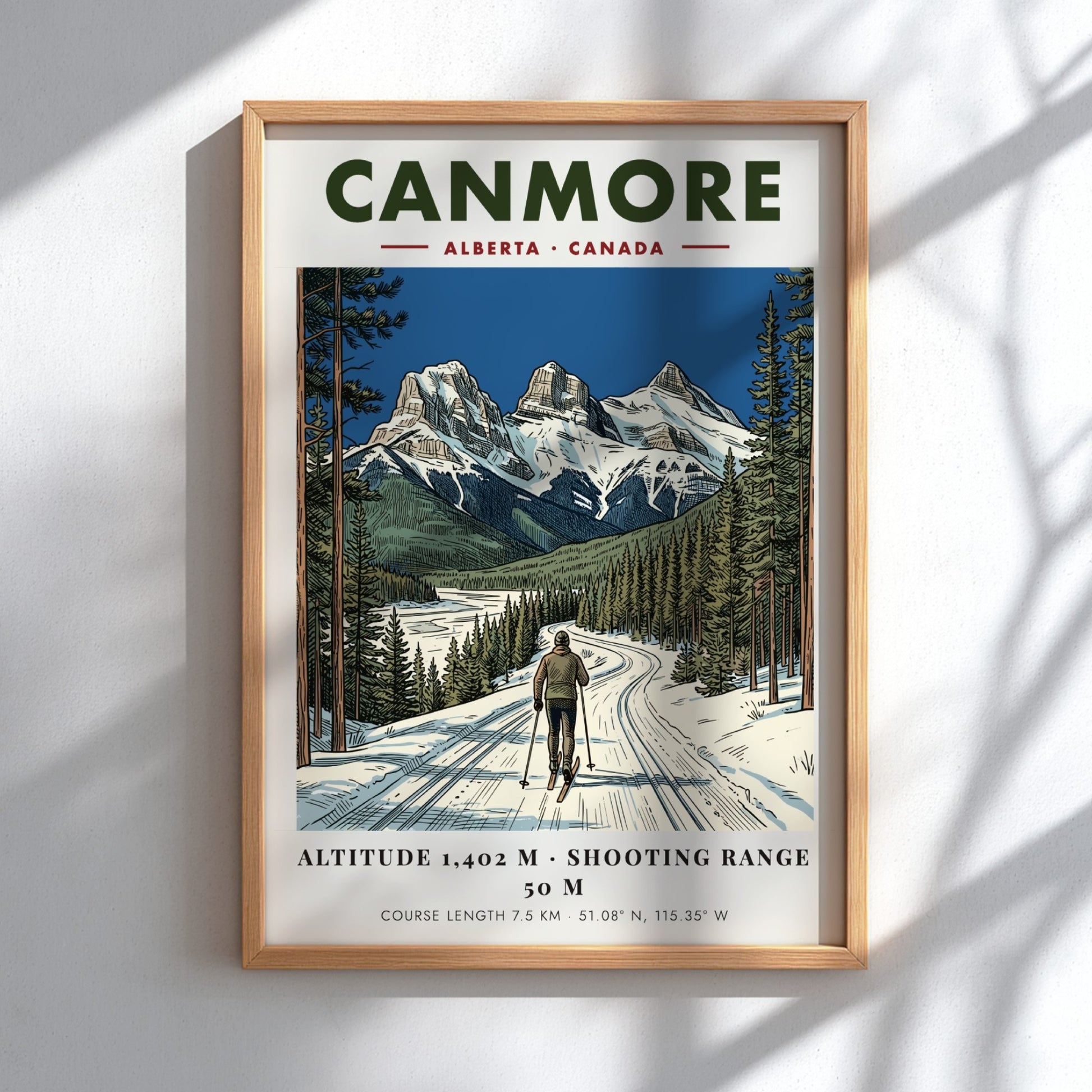 Poster of a lone skier on a snowy track beneath Canmore mountain peaks.