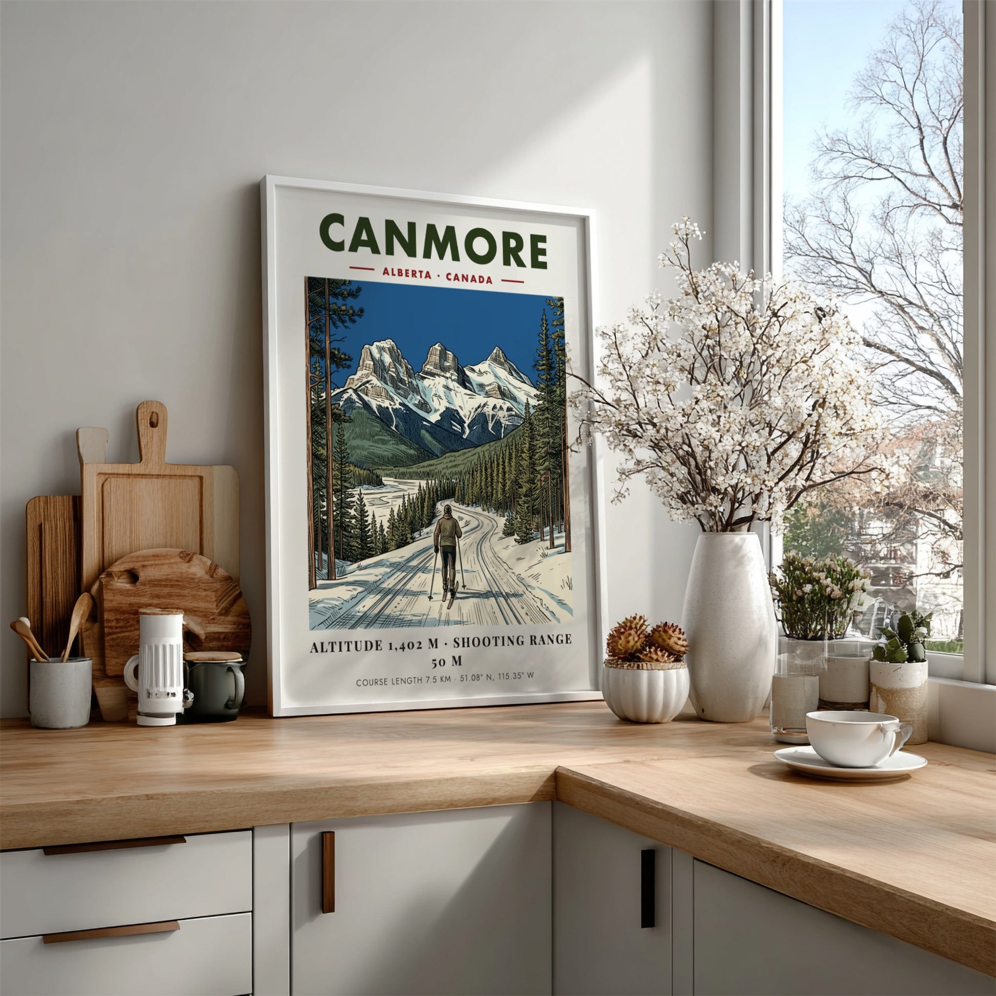 Poster of a lone skier on a snowy track beneath Canmore mountain peaks.