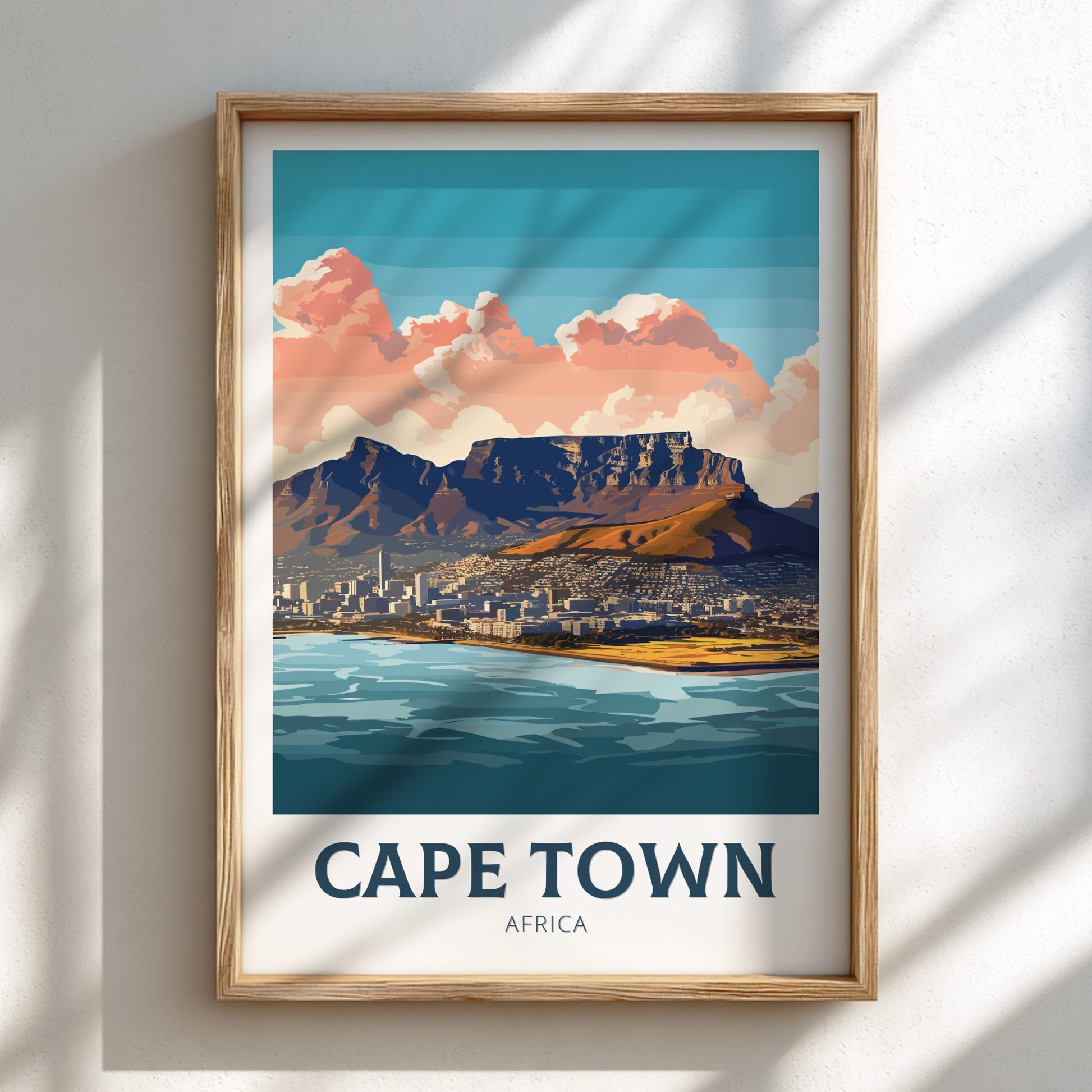 Framed artwork of Cape Town with Table Mountain and waterfront.