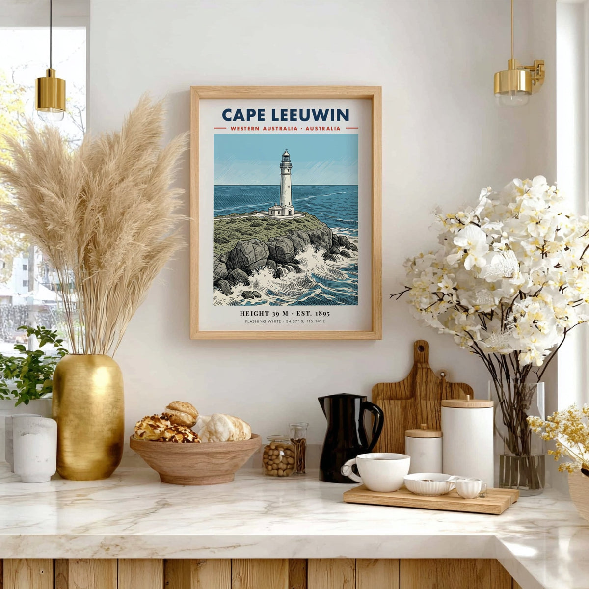 Poster featuring the historic white Cape Leeuwin lighthouse perched on rocky cliffs above blue waves.