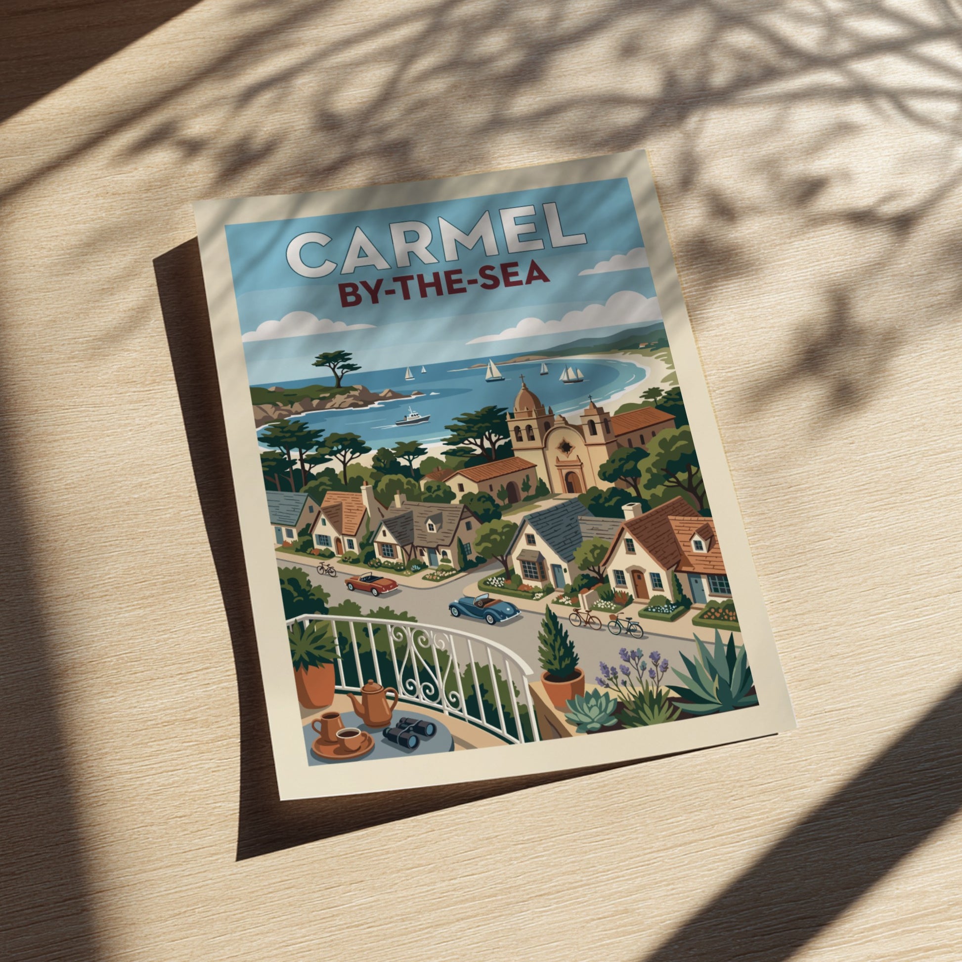 Carmel-by-the-Sea coastal town print with vintage cars, mission church, and sailboats.