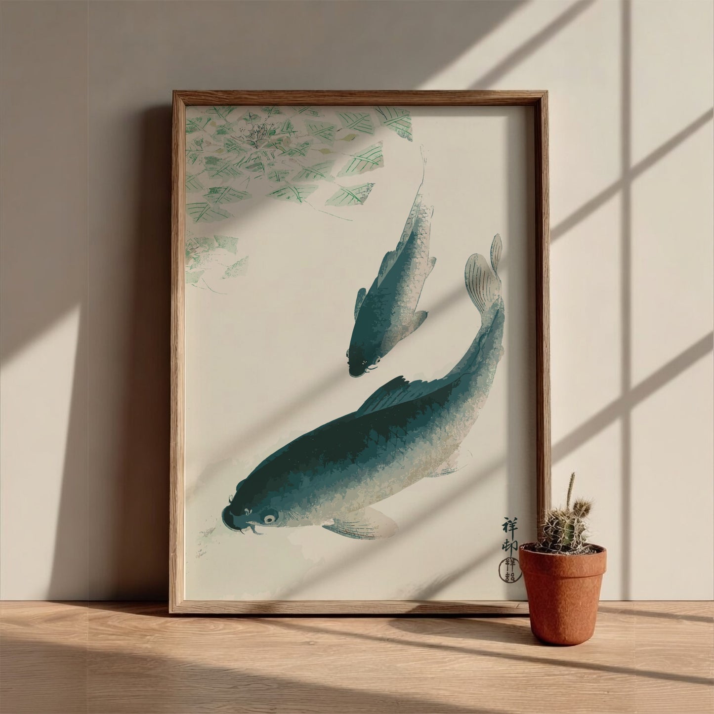 Poster of Ohara Koson's Japanese art print featuring two carp or koi fish swimming in water with green lily