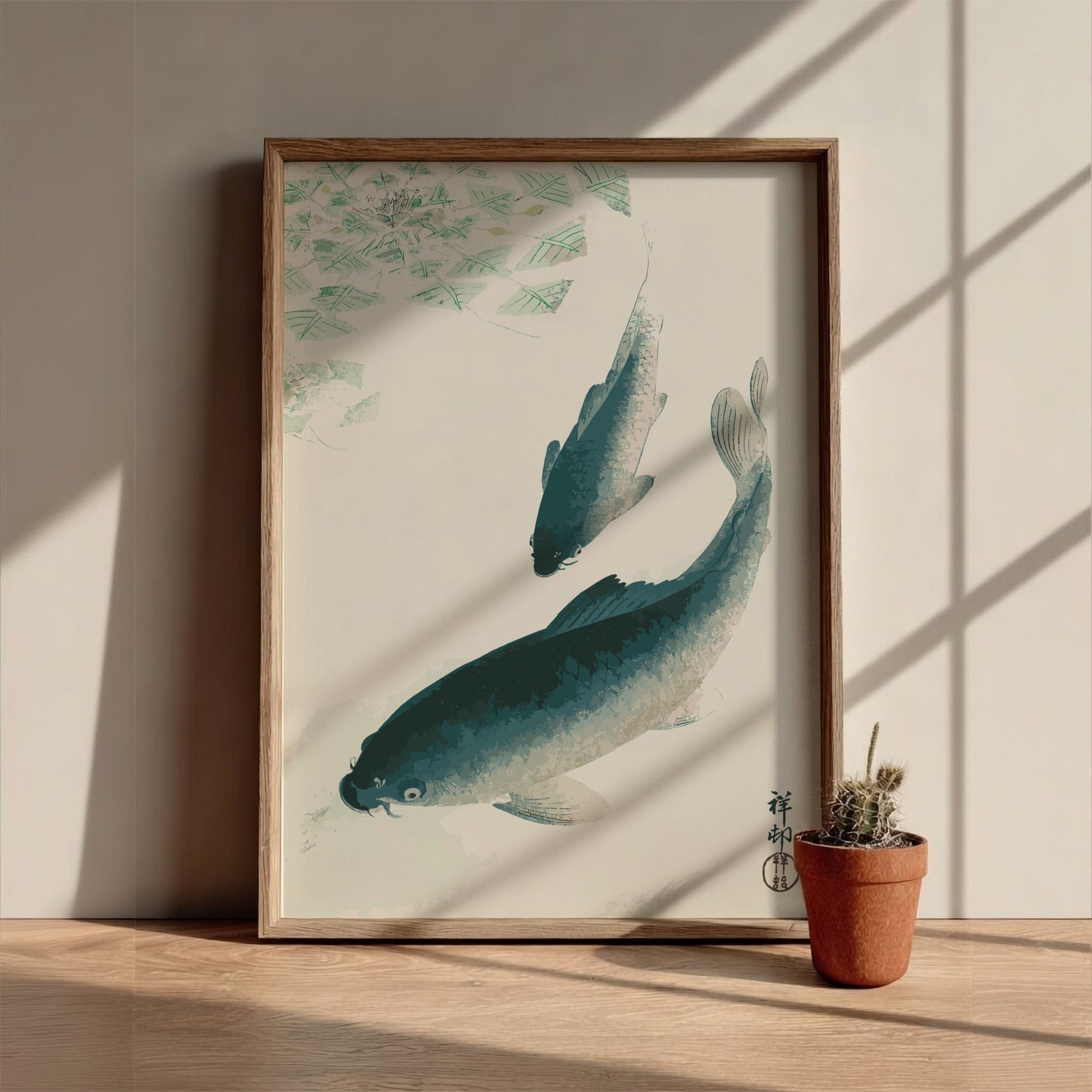 Poster of Ohara Koson's Japanese art print featuring two carp or koi fish swimming in water with green lily