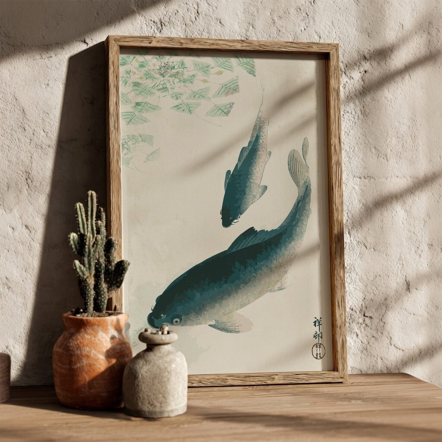 Poster of Ohara Koson's Japanese art print featuring two carp or koi fish swimming in water with green lily