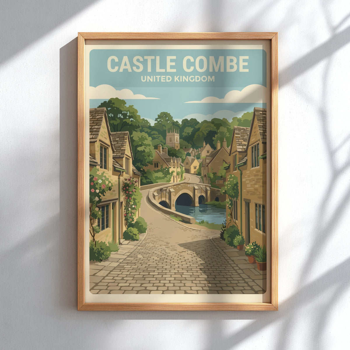 Poster of Castle Combe featuring stone cottages, a stone bridge, and cobblestone streets.