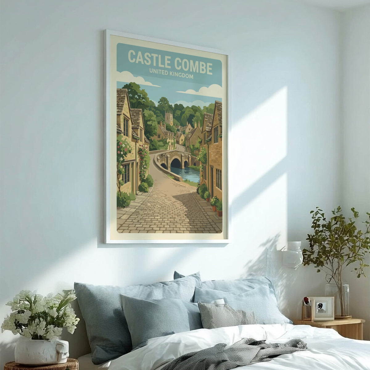 Poster of Castle Combe featuring stone cottages, a stone bridge, and cobblestone streets.