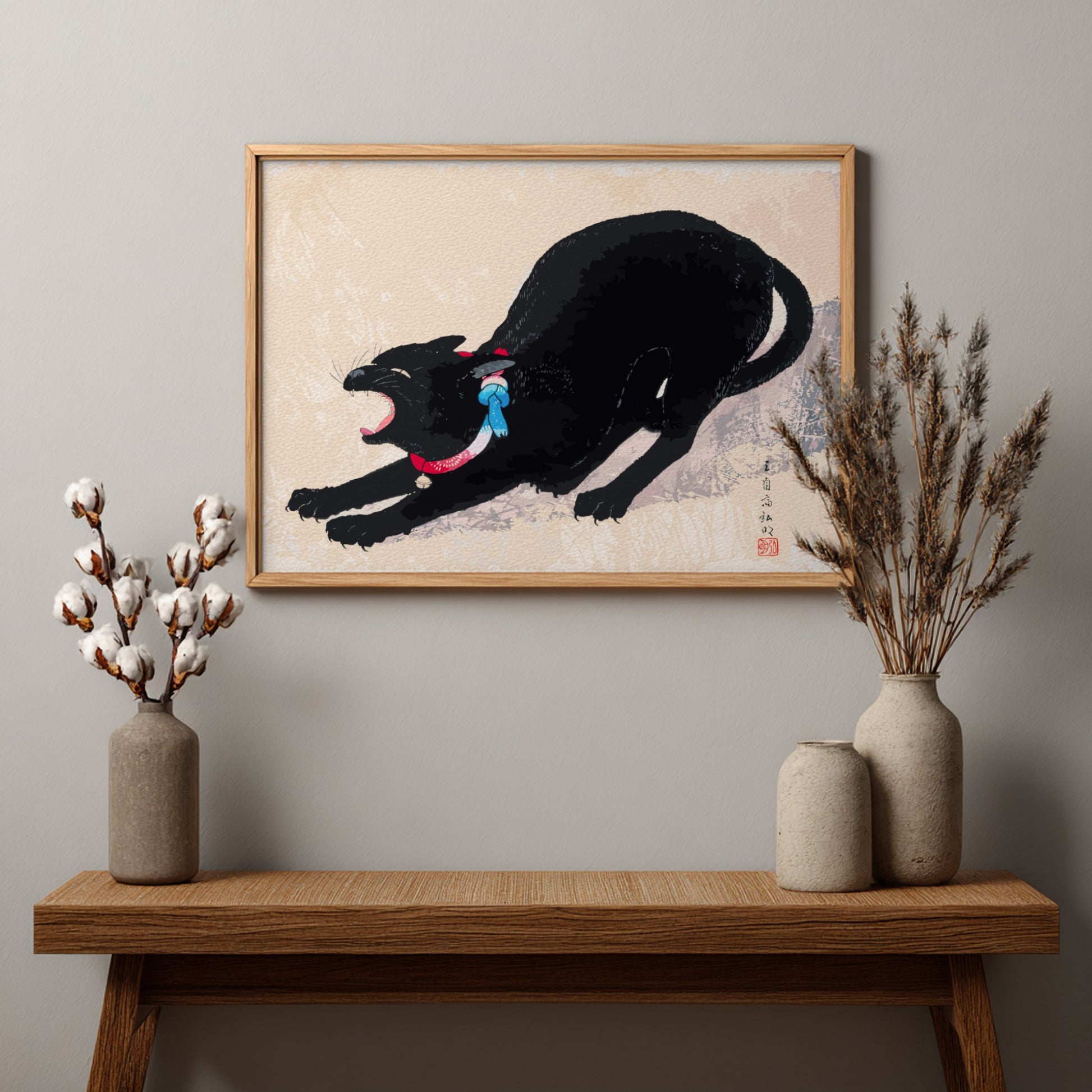 Japanese art print of a black cat yawning, by Hiroaki Takahashi, with red and blue collar.
