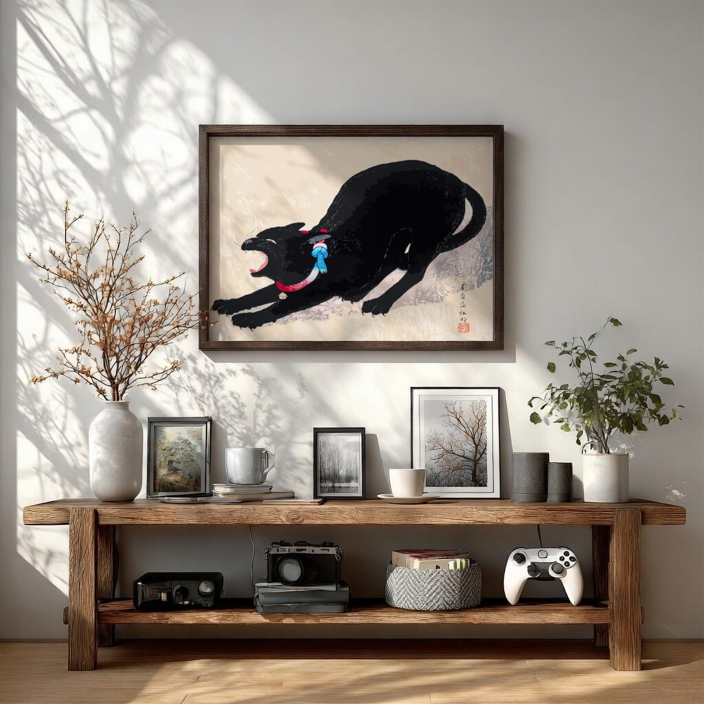 Japanese art print of a black cat yawning, by Hiroaki Takahashi, with red and blue collar.
