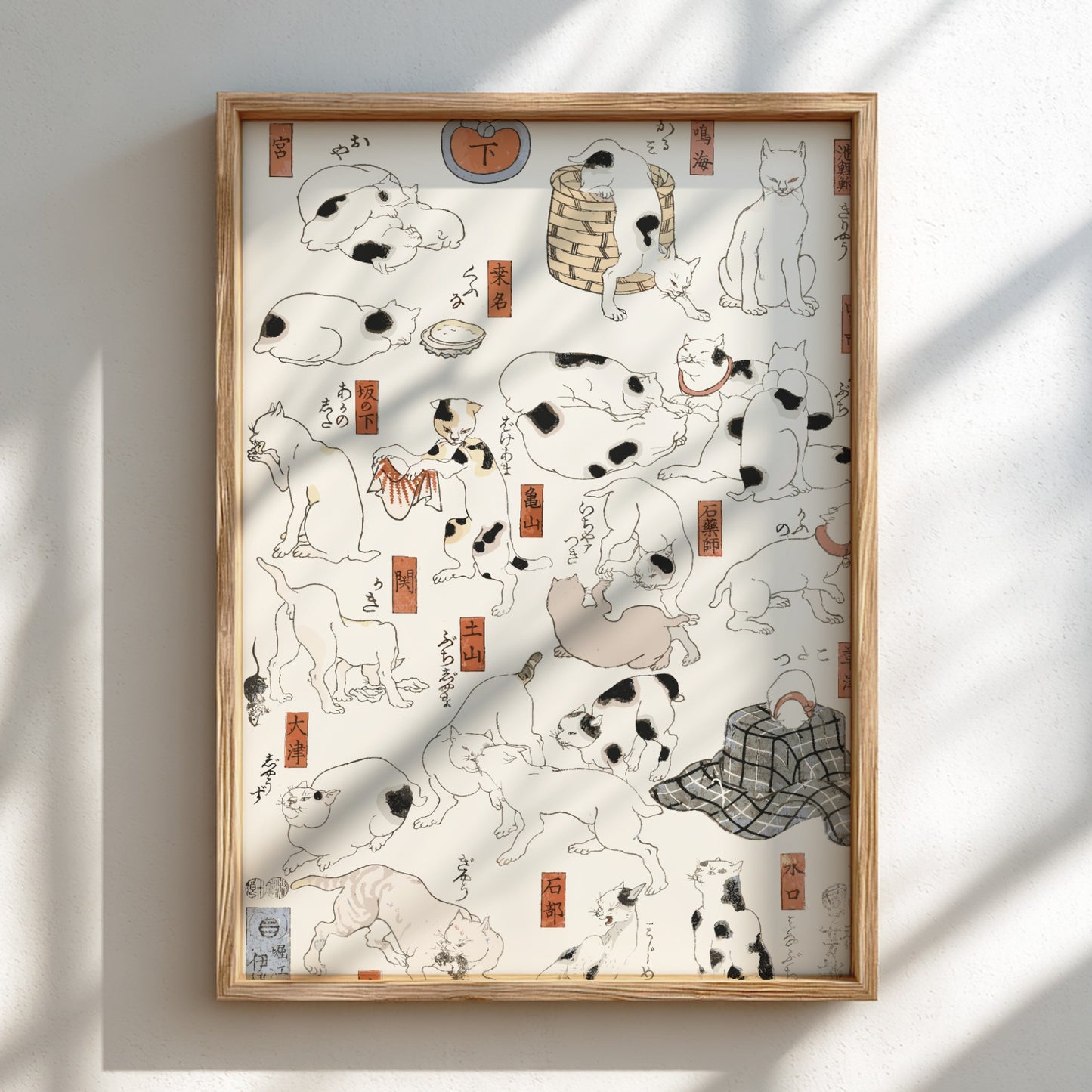 Poster of Utagawa Kuniyoshi's "Cats" drawing, featuring multiple cats in a Japanese woodblock print style.