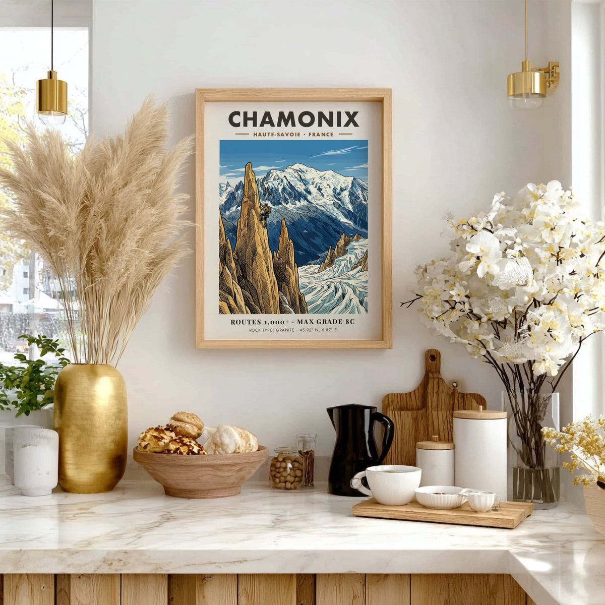 Poster of a climber scaling a granite peak in Chamonix with snowy mountains.