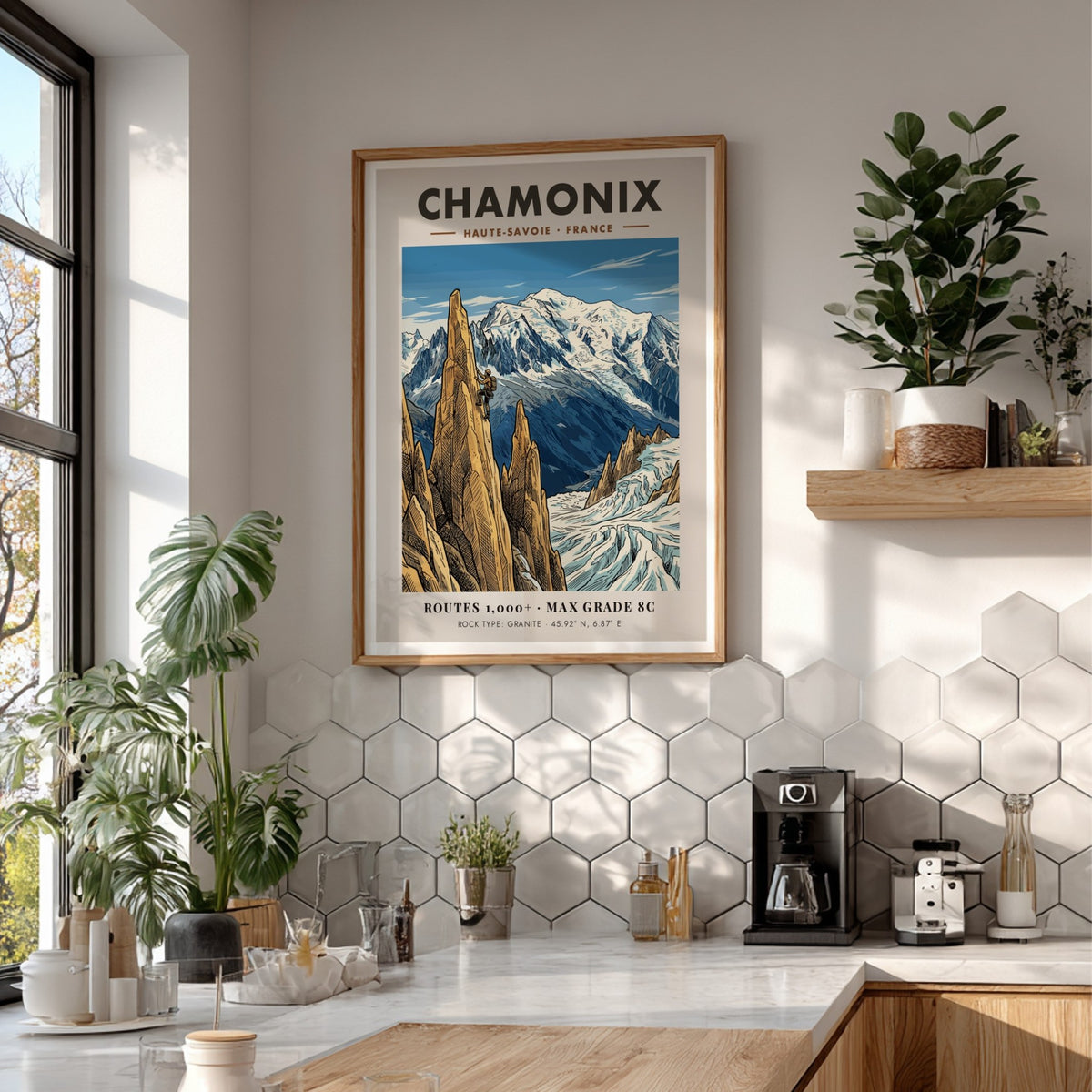 Poster of a climber scaling a granite peak in Chamonix with snowy mountains.