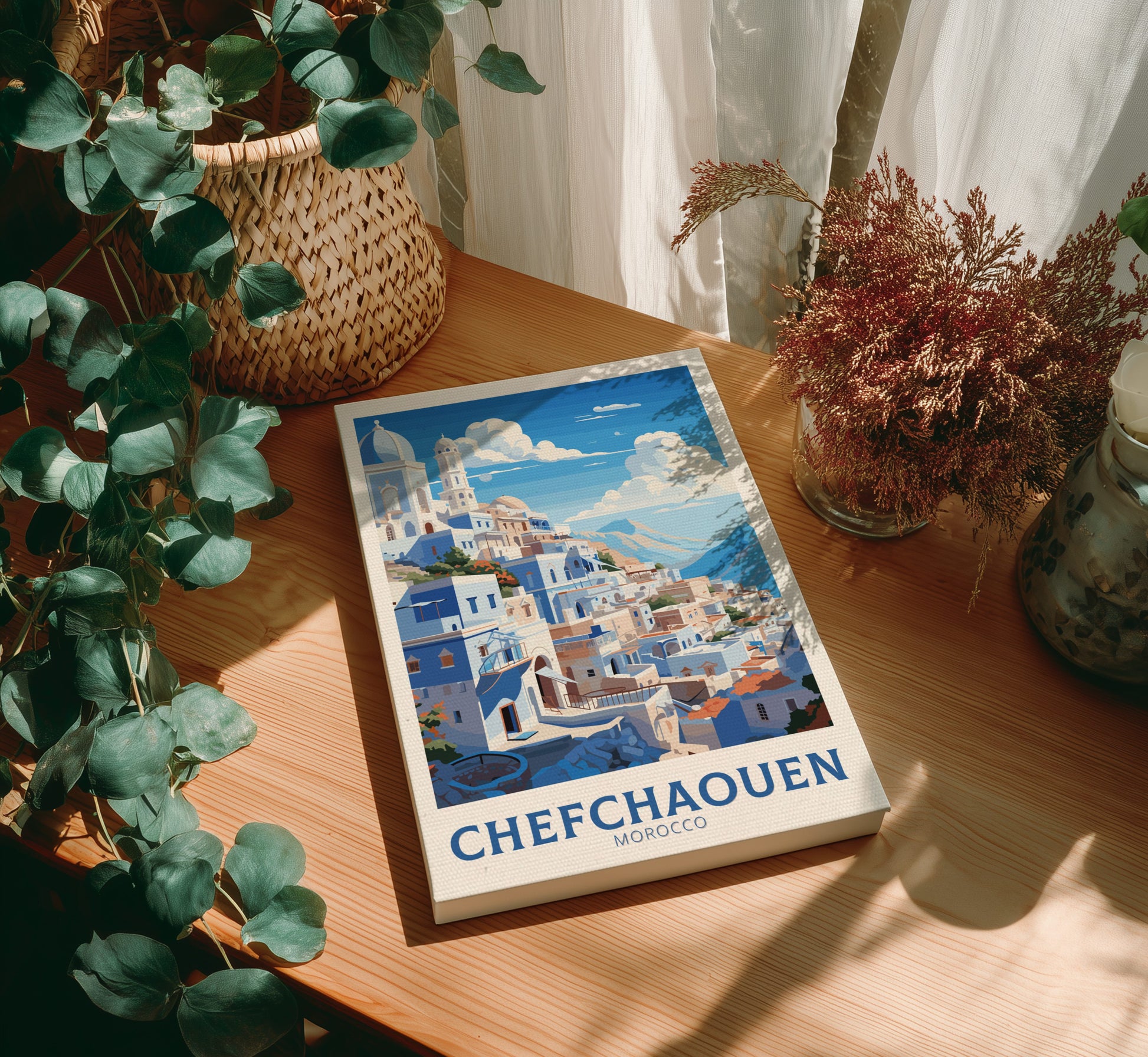 Canvas 'Chefchaouen Morocco' on a wooden table with plants