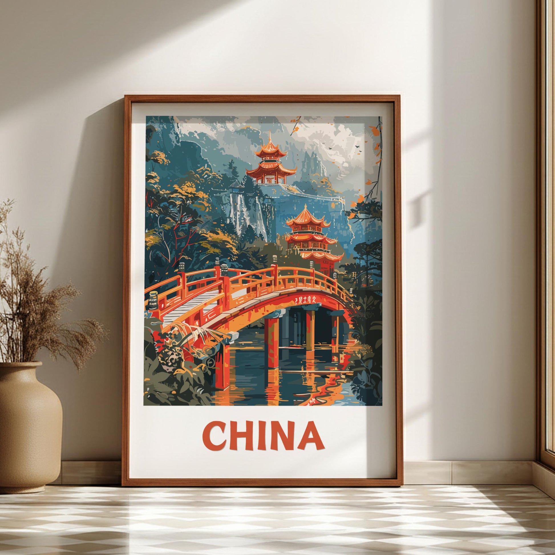 Framed artwork of a Chinese landscape with pagodas and a bridge, labeled 'China', on a wall.