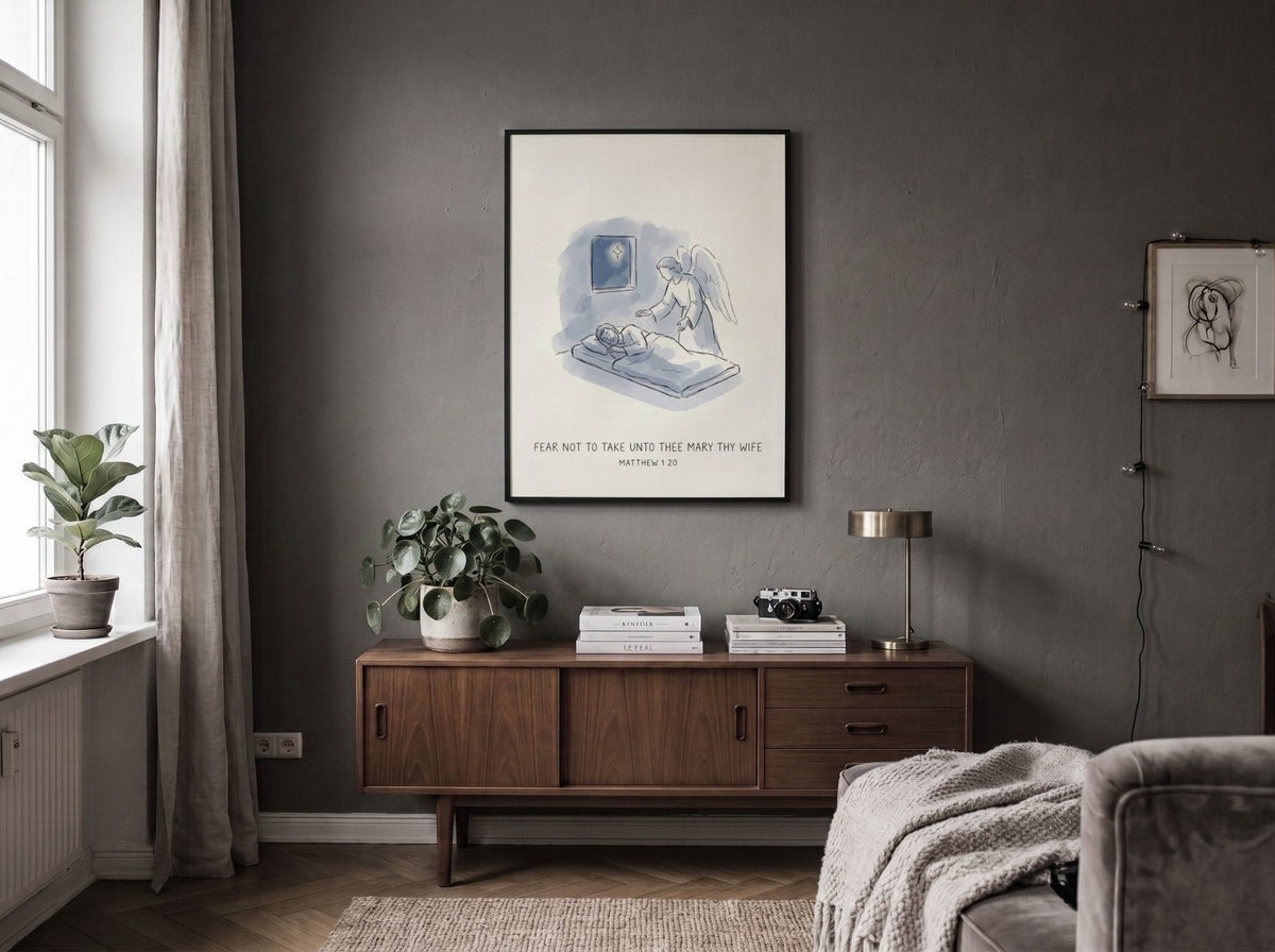 Poster featuring an angel visiting a sleeping man under a star, soft blue illustration.