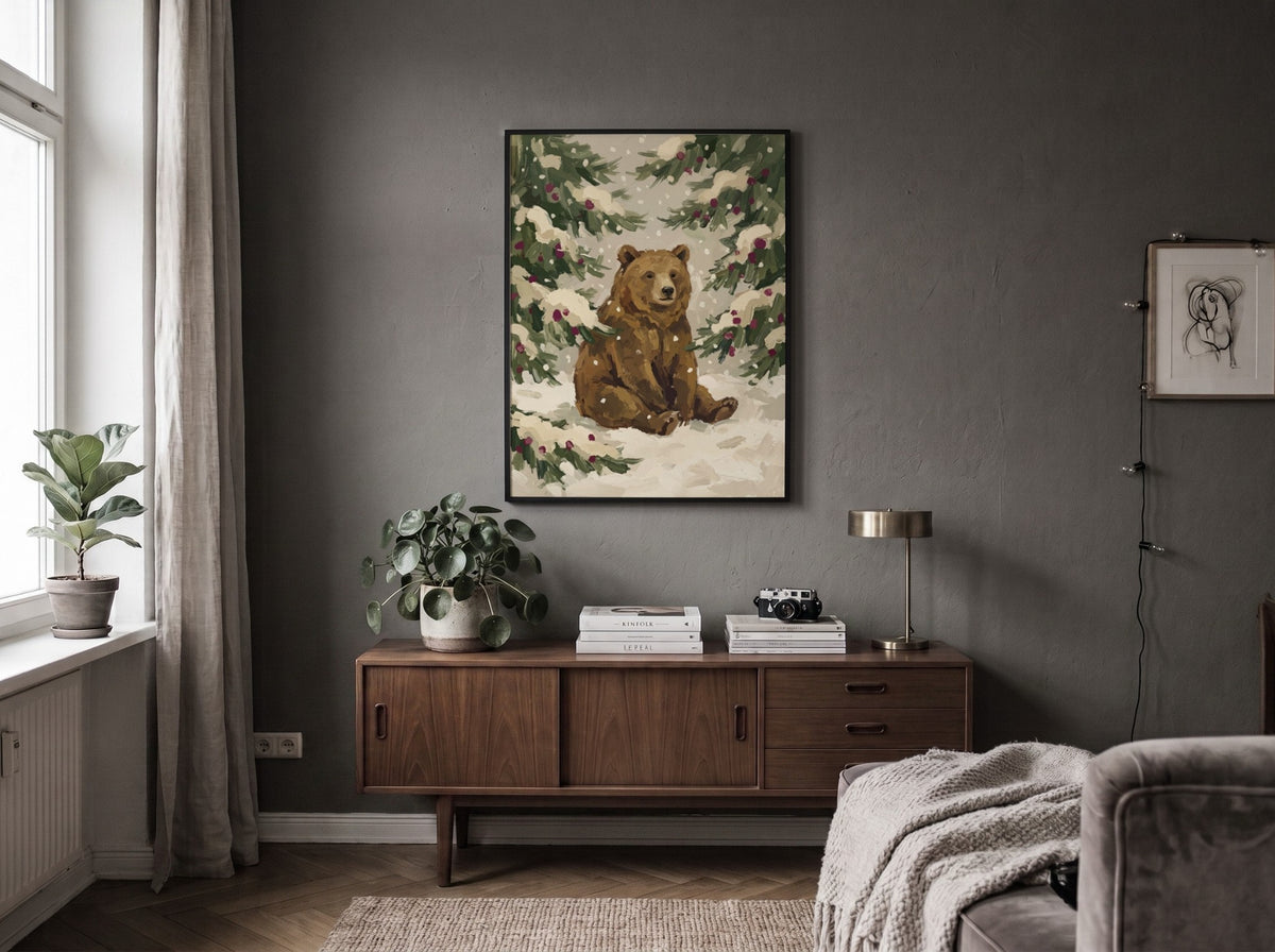 Poster of a brown bear sitting in a snowy forest with pine branches