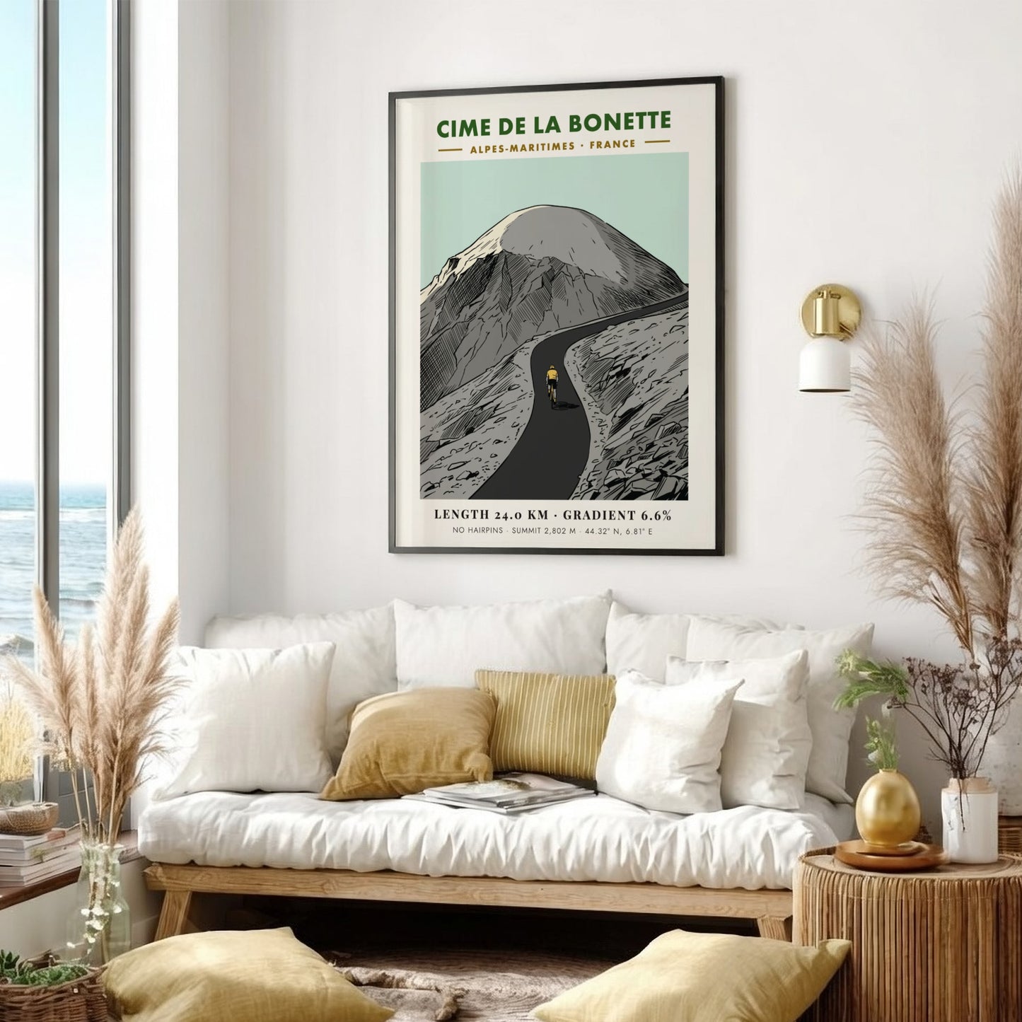 Poster of a lone cyclist riding up the winding Cime De La Bonette mountain.
