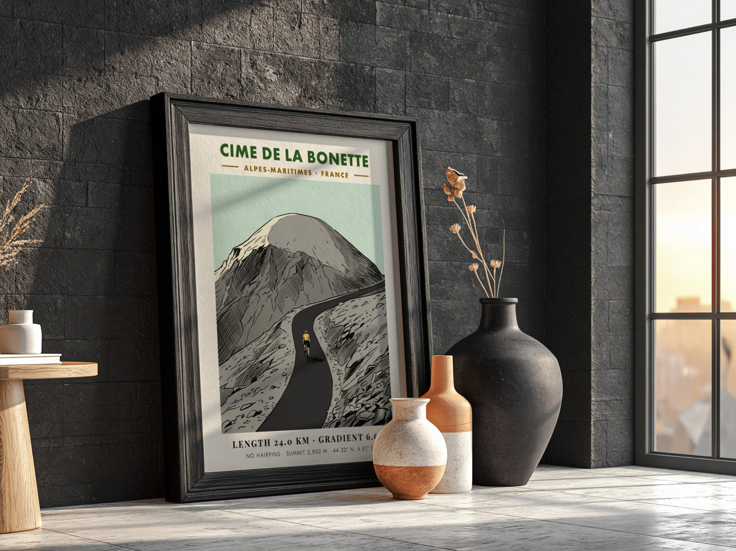 Poster of a lone cyclist riding up the winding Cime De La Bonette mountain.