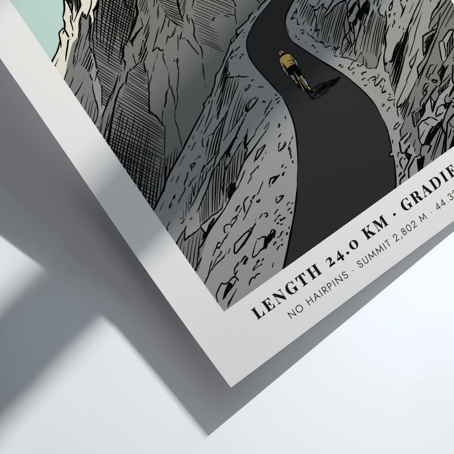 Poster of a lone cyclist riding up the winding Cime De La Bonette mountain.