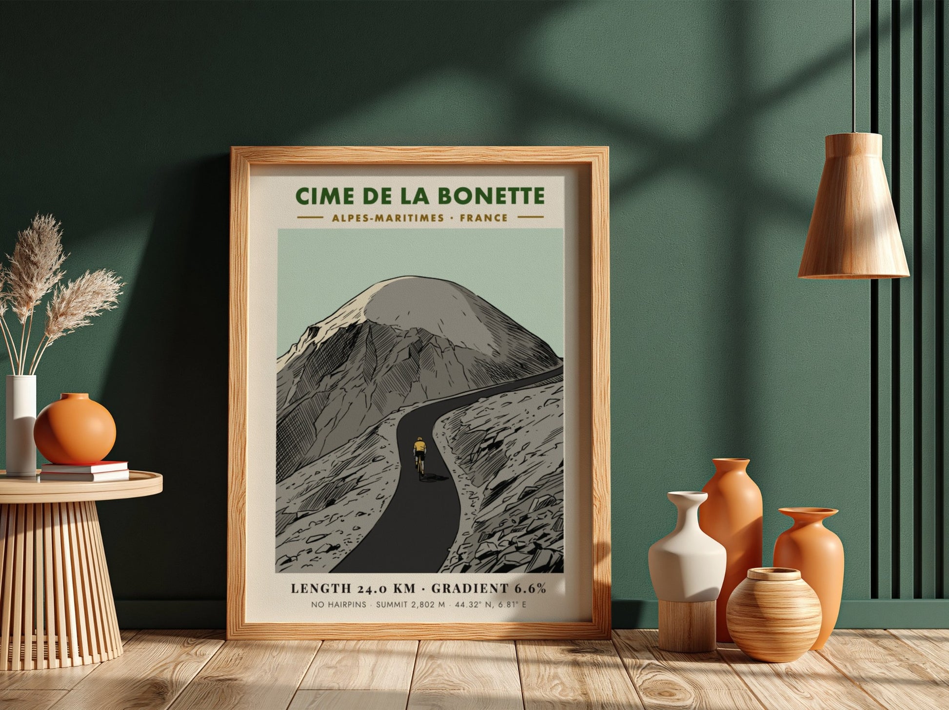 Poster of a lone cyclist riding up the winding Cime De La Bonette mountain.