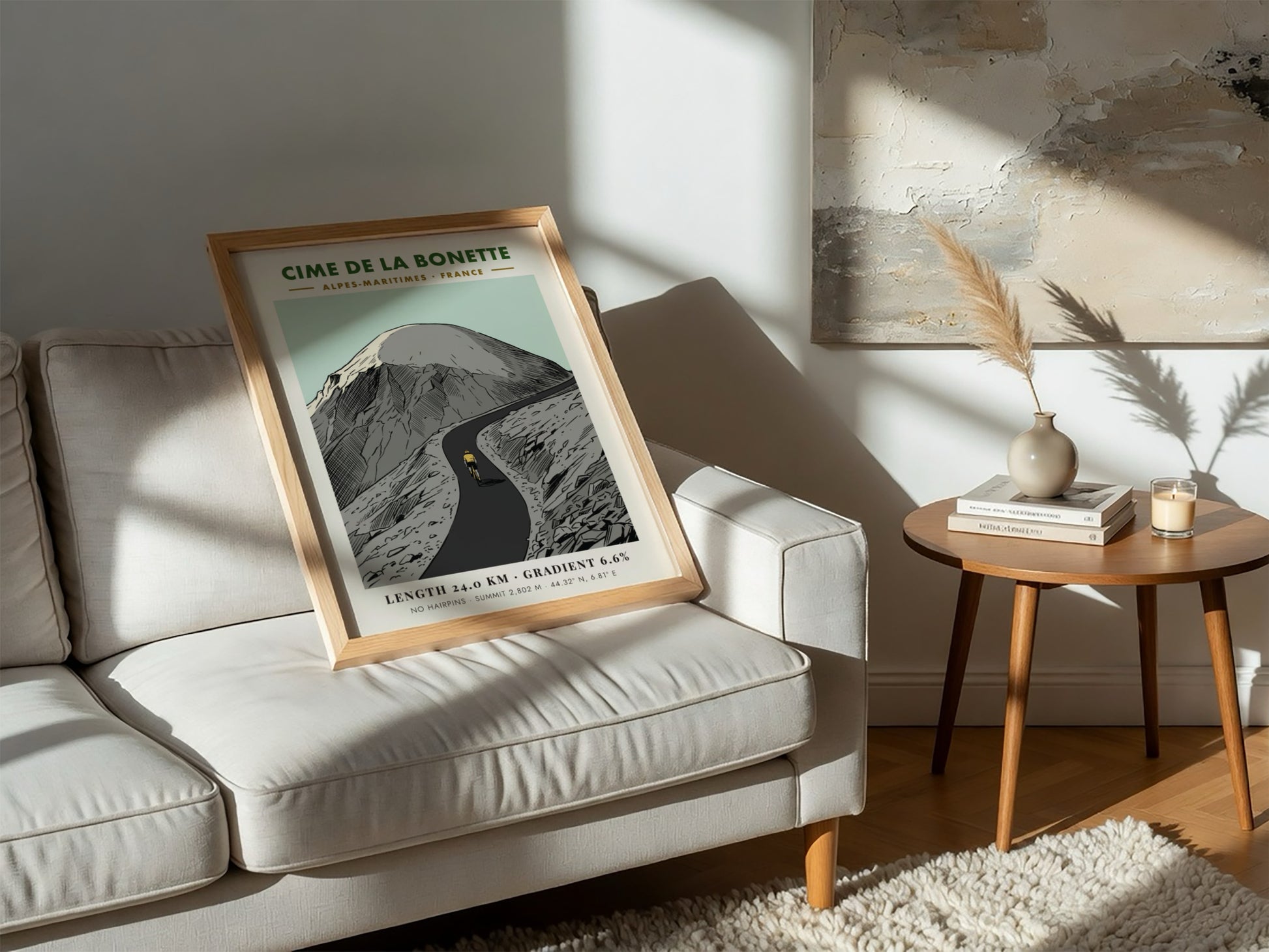 Poster of a lone cyclist riding up the winding Cime De La Bonette mountain.