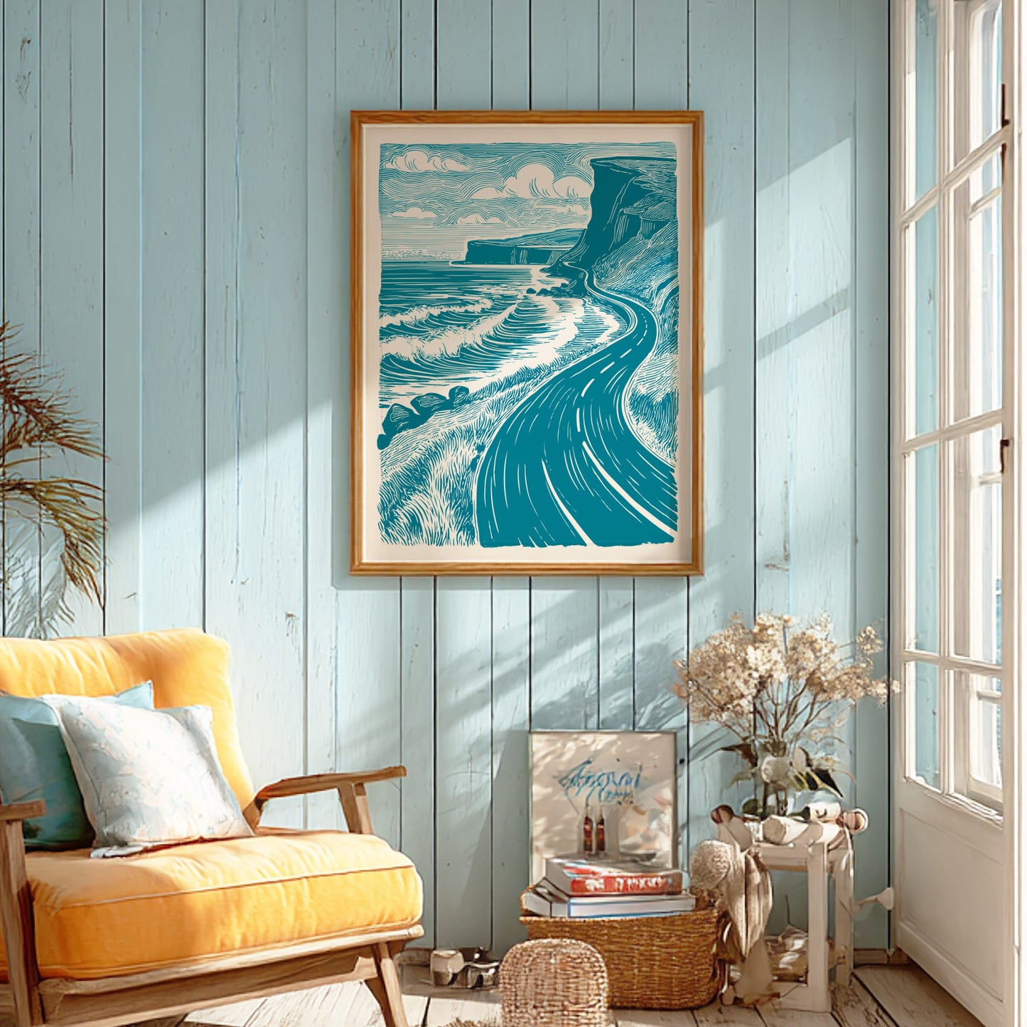 Living room with a yellow sofa, framed artwork of a coastal scene, and decorative items.