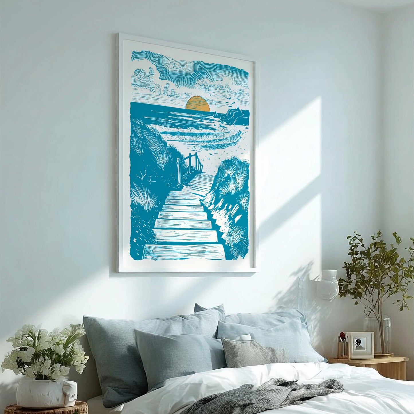 Poster of a coastal artwork on a white wall. 