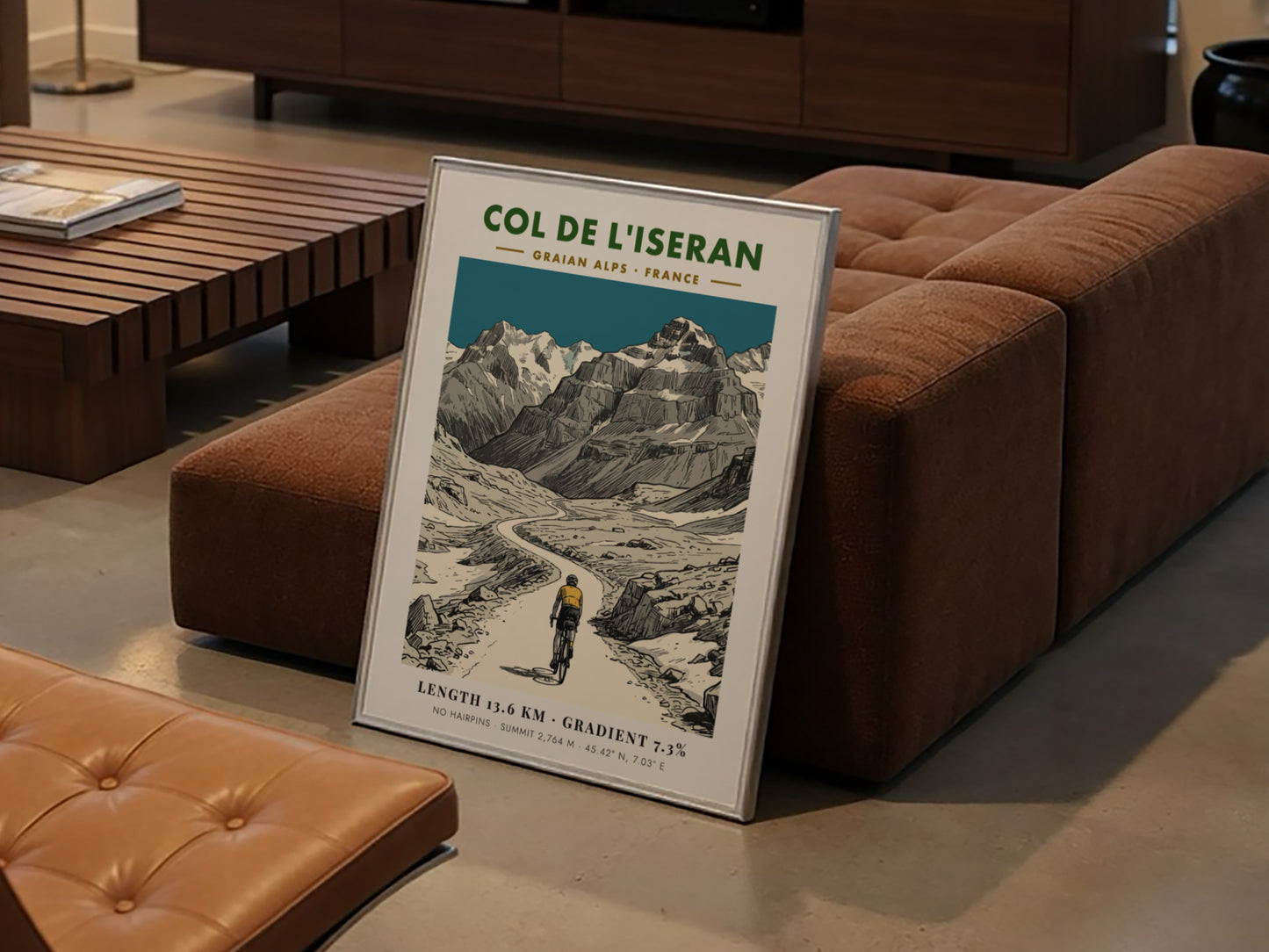 Poster of a cyclist climbing the winding road of Col De L'iseran mountainside.