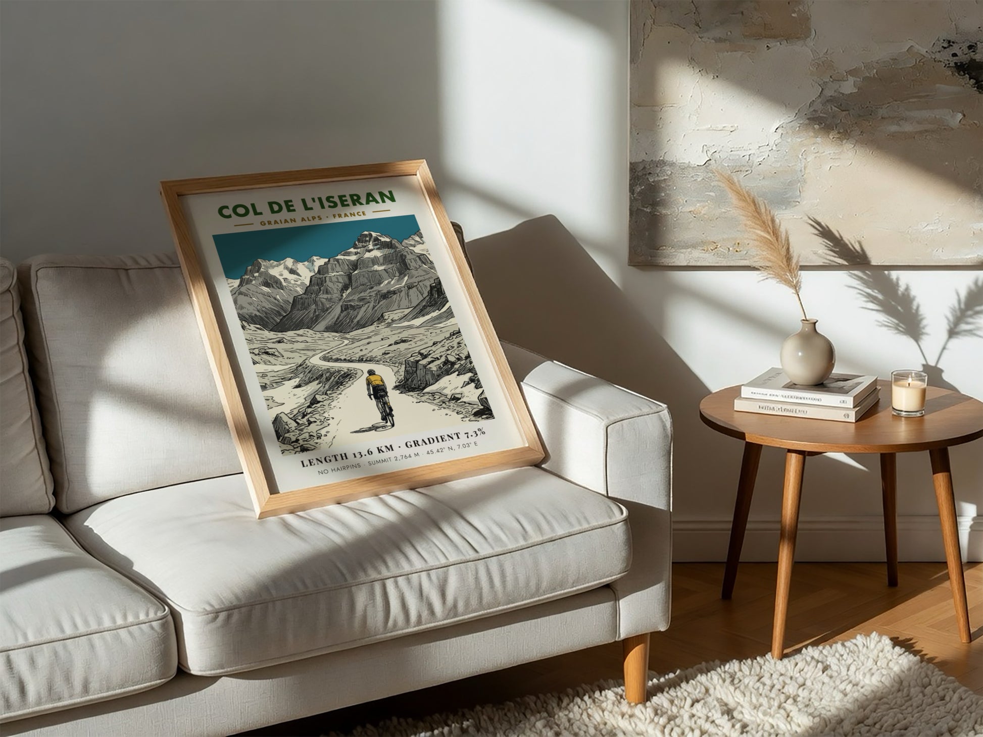 Poster of a cyclist climbing the winding road of Col De L'iseran mountainside.
