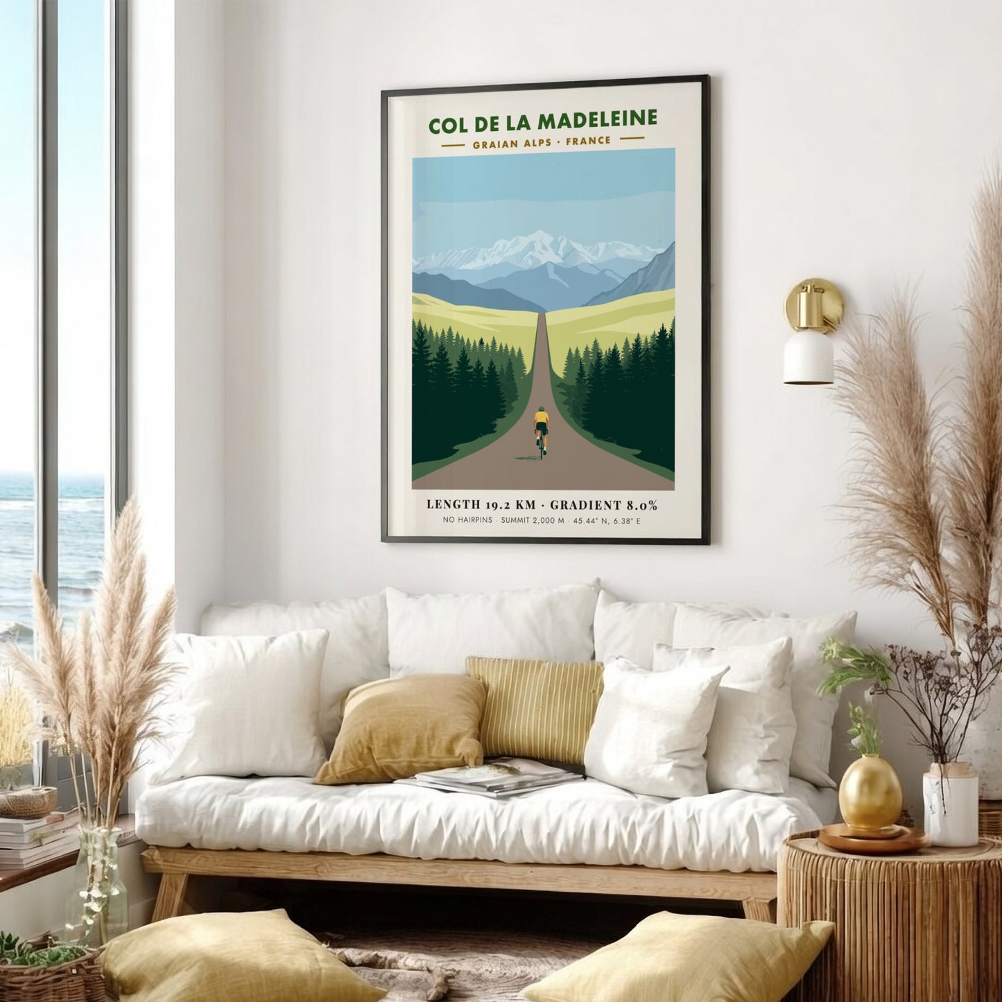 Poster of a cyclist climbing toward snow-capped mountains in the French Graian Alps landscape.