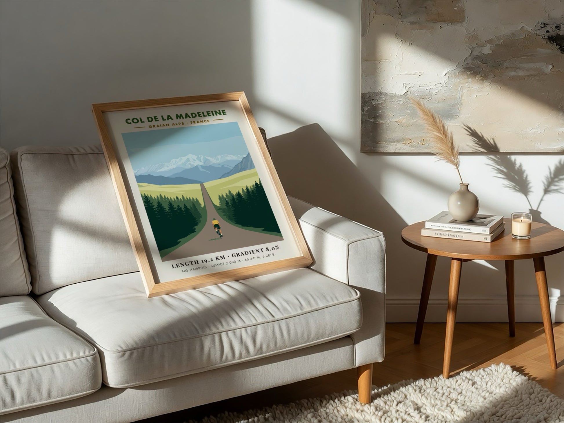 Poster of a cyclist climbing toward snow-capped mountains in the French Graian Alps landscape.