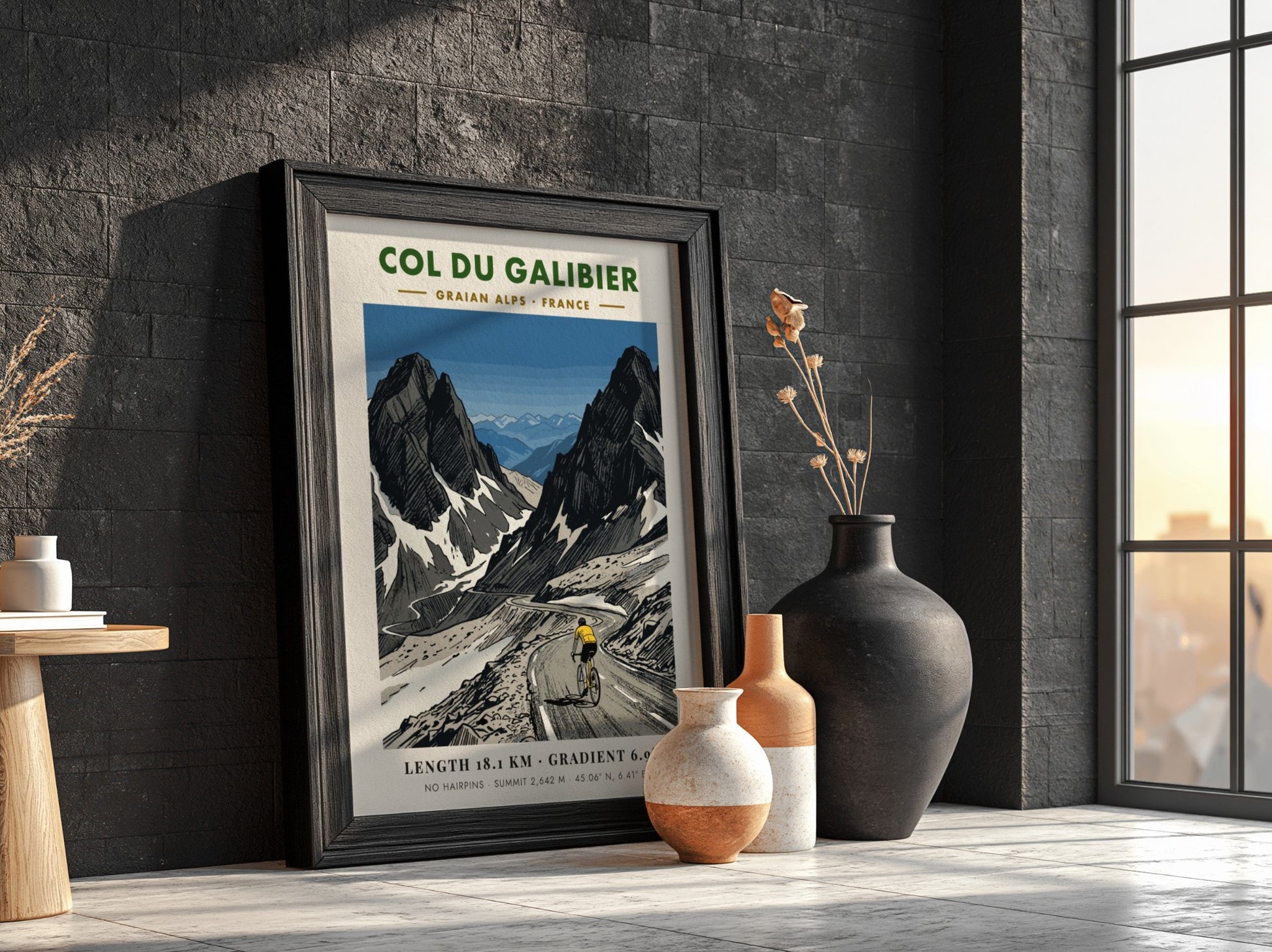 Poster of a cyclist climbing the steep, rugged Col Du Galibier mountain pass.