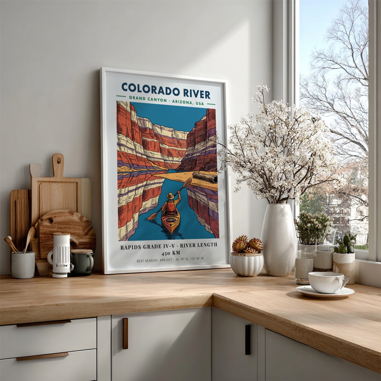 Poster of a kayaker on the Colorado River surrounded by colorful Grand Canyon cliffs.