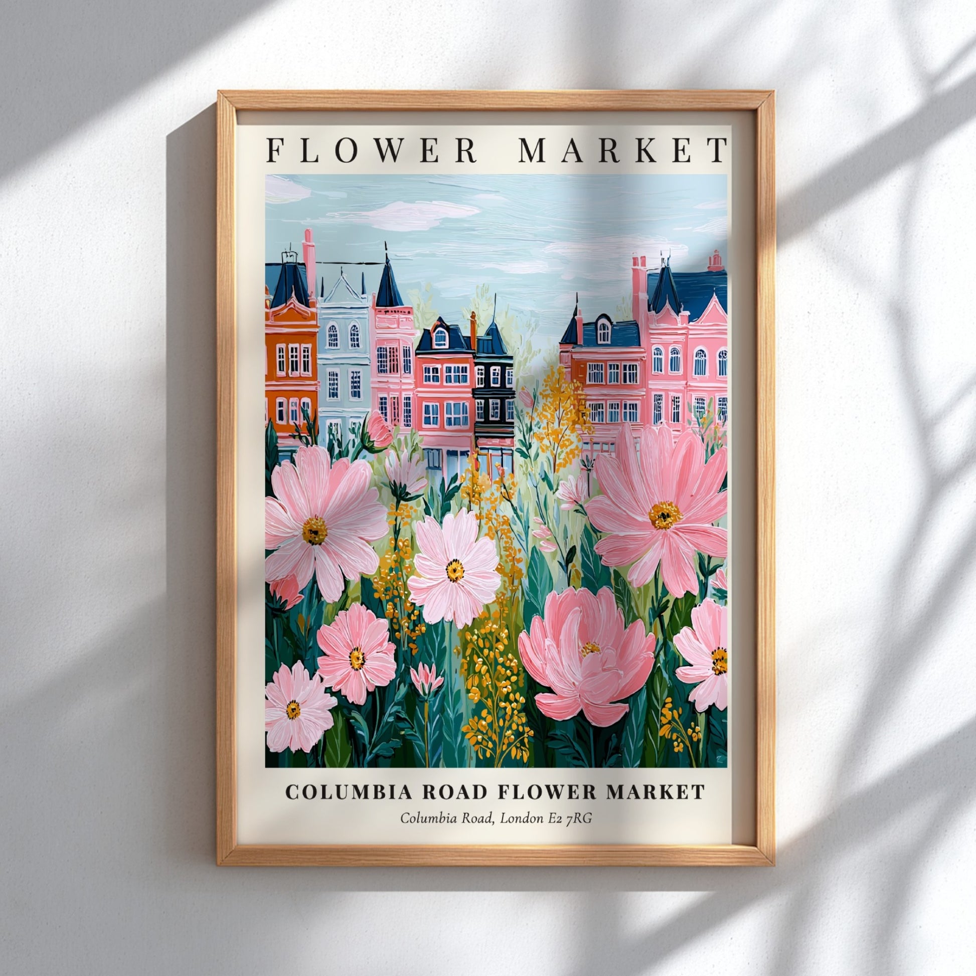 Columbia Road Flower Market print featuring pink flowers and colorful townhouses in a whimsical style