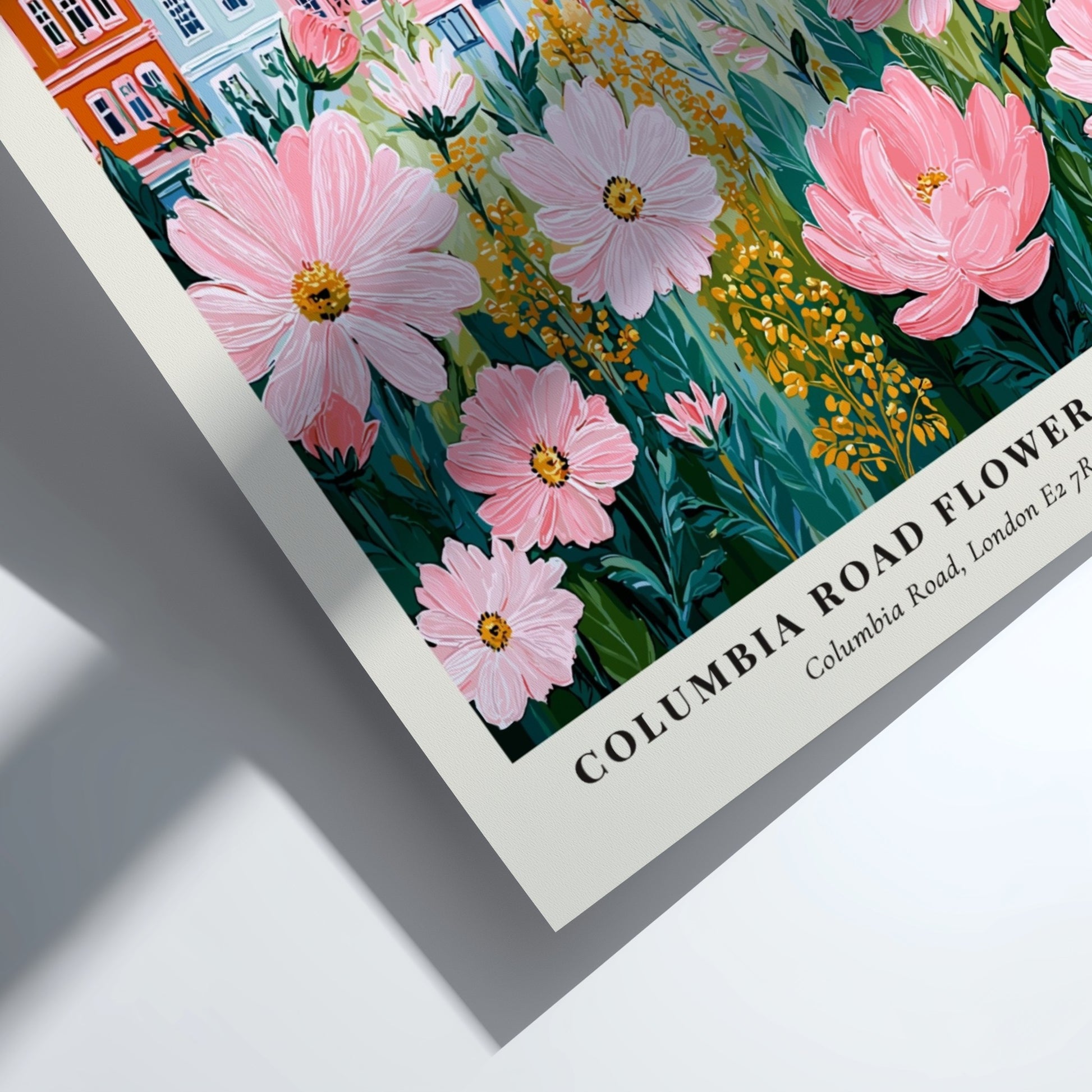 Columbia Road Flower Market print featuring pink flowers and colorful townhouses in a whimsical style