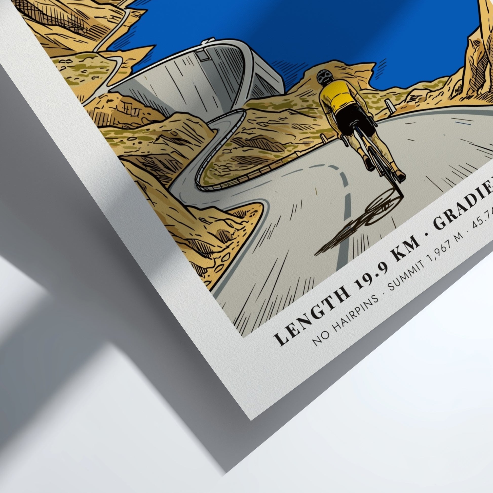 Poster of a cyclist climbing the Cormet de Roselend road above a blue reservoir.